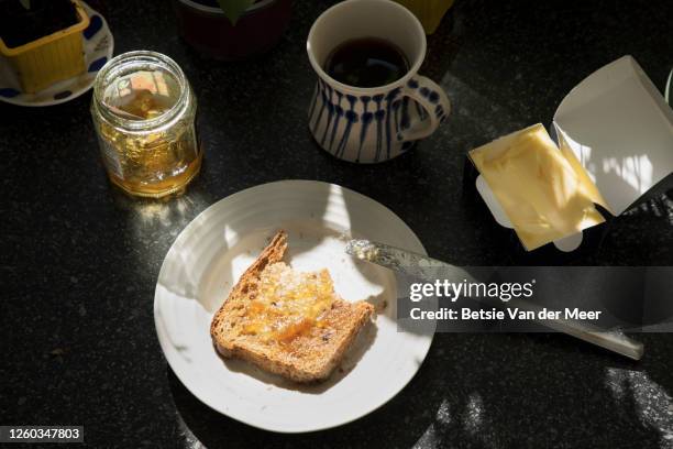 topview of still life of breakfast , toast with marmalde and coffee. - bread butter stock pictures, royalty-free photos & images