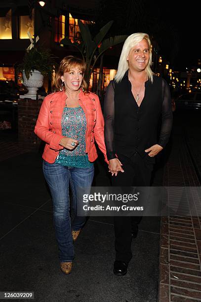 Paula Jones and television personality Daniel DiCriscio are seen on the street on April 27, 2011 in Los Angeles, California.