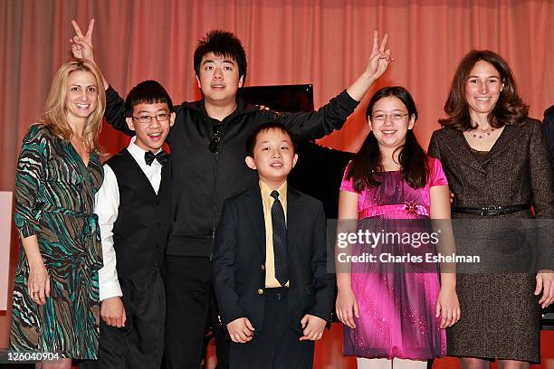 Principal Jodi Hyde, pianists Derek Wang, Lang Lang, Charlie Liu; and Anna Larsen, Lang Lang International Music Foundation Executive Director Cari...