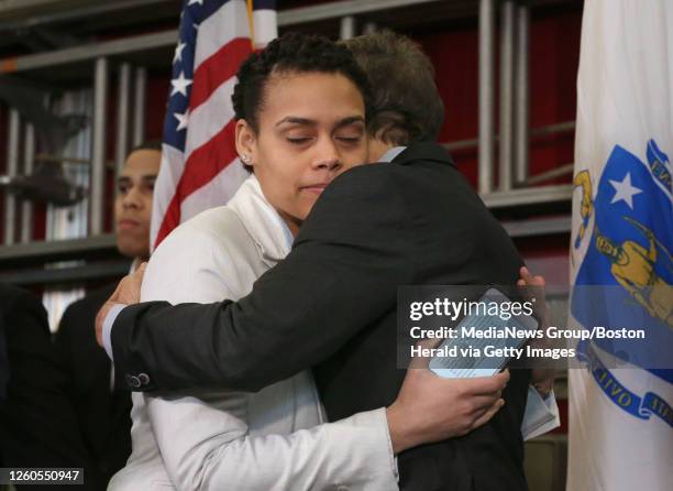 Leonel Rondon's sister, Lucianny Rondon, embraces attorney Doug Sheff during a news conference announcing new federal pipeline legislation named...