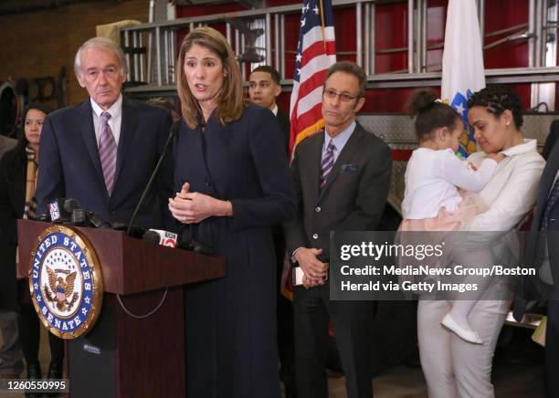 Leonel Rondon's sister, Lucianny Rondon, holds her daughter, Rihanny as U.S. Sen. Edward Markey and U.S. Rep. Lori Trahan announce new federal...