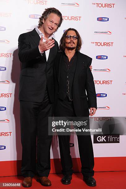 Director Florian Henckel von Donnersmarck and actor Johnny Depp attend the 'The Tourist' premiere on December 15, 2010 in Rome, Italy.