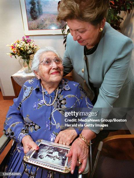 - Mrs. Gayane Kanayan and her daughter Olga Proudian share a quiet moment while looking at an old family photograph. Drastamad Kanayan, more...
