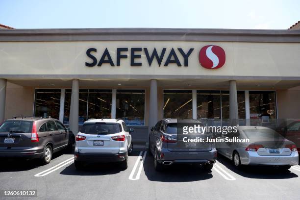 Cars sit parked in front of a Safeway store on July 27, 2020 in Mill Valley, California. Albertsons, parent company of Safeway and one of the largest...
