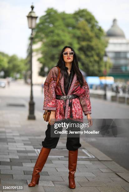 Rebecca Mir wearing complete Etro look and bag on July 21, 2020 in Munich, Germany.