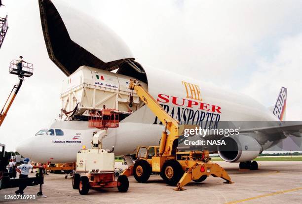 Italy's Raffaello Multi-purpose Logistics Module is off-loaded from its Beluga Super Transporter 05 August 1999, at Kennedy Space Center, FL. The...
