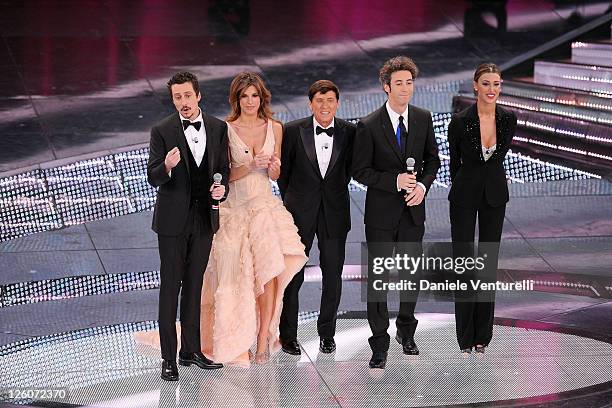 Luca Bizzarri, Elisabetta Canalis, Gianni Morandi, Paolo Kessisoglu and Belen Rodriguez attend the 61th Sanremo Song Festival at the Ariston Theatre...