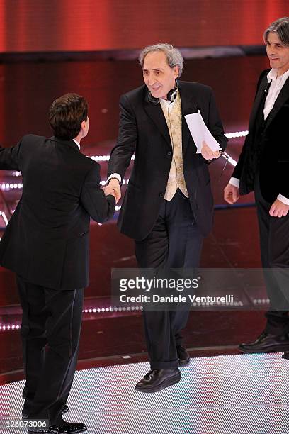 Gianni Morandi, Franco Battiato and Luca Madonia attend the 61th Sanremo Song Festival at the Ariston Theatre on February 17, 2011 in San Remo, Italy.