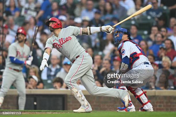 Nick Castellanos of the Philadelphia Phillies hits a three-run home run in the second inning against the Chicago Cubs at Wrigley Field on June 28,...