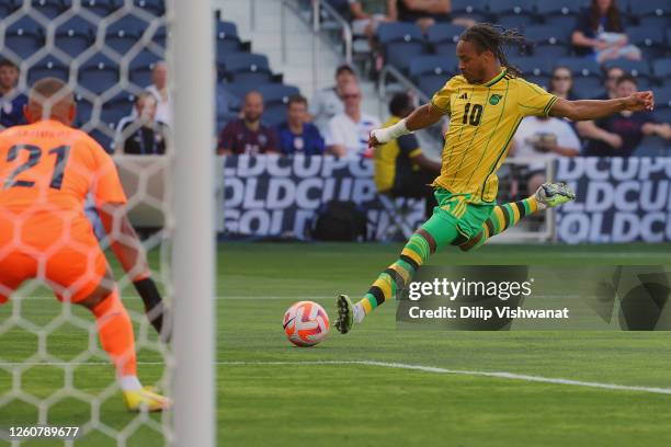 Bobby Reid of Jamaica takes a shot on goal against Trinidad & Tobago in the first half during the 2023 Concacaf Gold Cup at Citypark on June 28, 2023...