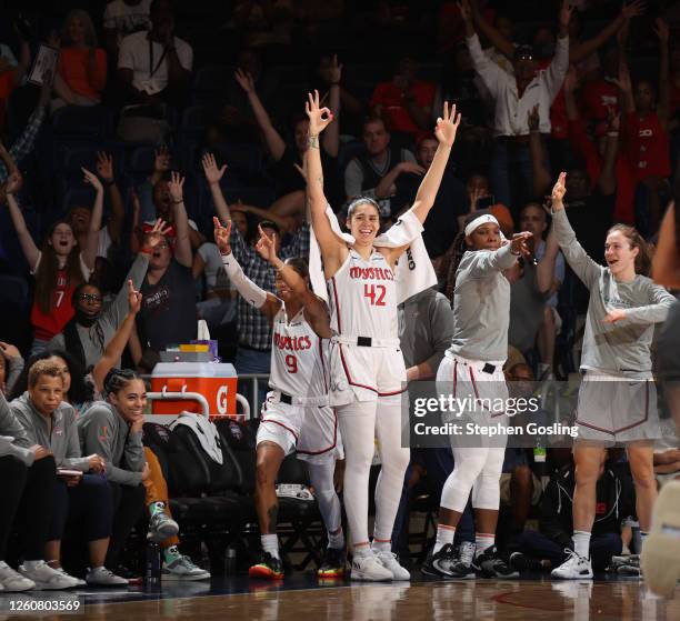 Washington Mystics celebrate a three point basket by Ariel Atkins during the game against the Atlanta Dream on June 28, 2023 at Entertainment and...