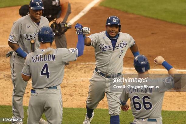 Maikel Franco of the Kansas City Royals celebrates his fourth inning two run home run and second of the game with Alex Gordon, Salvador Perez and...
