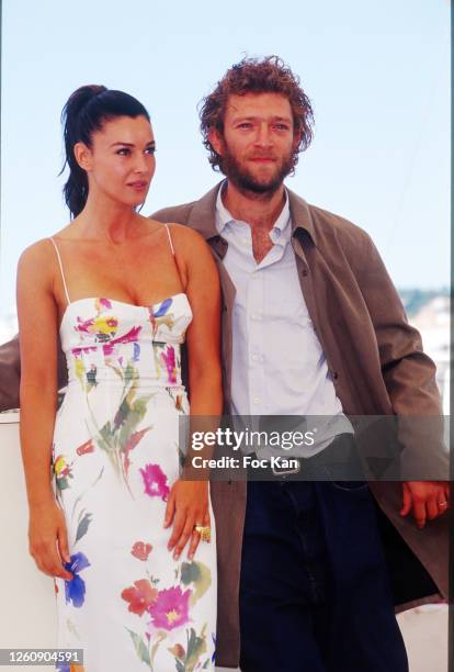 Monica Bellucci and Vincent Cassel attend the 55th Cannes Film Festival in May 2002, in Cannes, France.