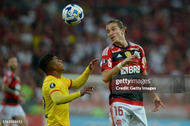 Filipe Luís of Flamengo heads the ball against Luis Cano of Aucas during the Copa CONMEBOL Libertadores 2023 group A match between Flamengo and Aucas...