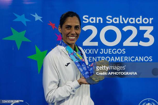 Nuria Diosdado of Team Mexico poses for photos with her medals during the Team Free Final of Artistic Swimming competition as part of the 2023...