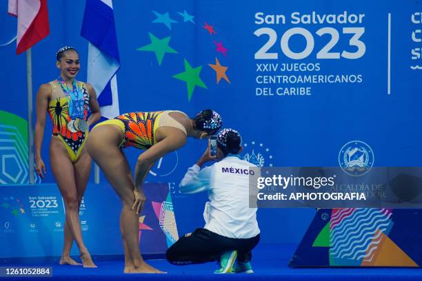 Swimmers of team Mexico take photos during the Team Free Final of Artistic Swimming competition as part of the 2023 Central American and Caribbean...