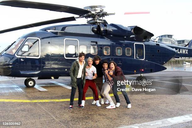 Harry Styles, Liam Payne, Niall Horan, Louis Tomlinson and Zain Malik of One Direction travel in a luxury helicopter to Glasgow, Manchester and...