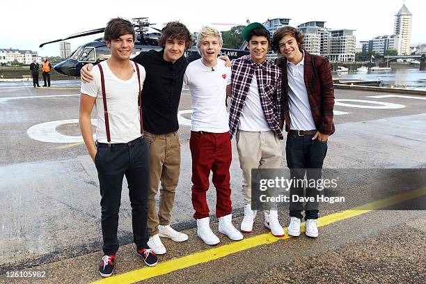 Harry Styles, Liam Payne, Niall Horan, Louis Tomlinson and Zayn Malik of One Direction travel in a luxury helicopter to Glasgow, Manchester and...