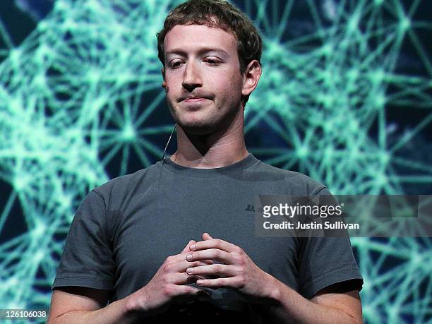 Facebook CEO Mark Zuckerberg pauses as he delivers a keynote address during the Facebook f8 conference on September 22, 2011 in San Francisco,...