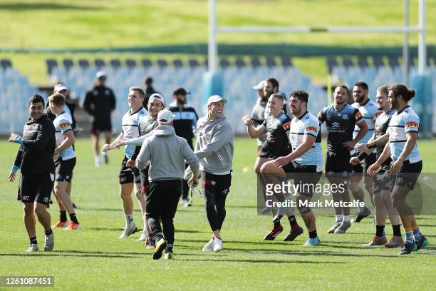Sharks players warm up during a Cronulla Sharks NRL training session on July 28, 2020 in Sydney, Australia.