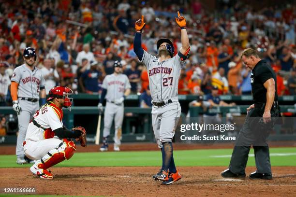 Jose Altuve of the Houston Astros celebrates his three-run home run in the eighth inning against the St. Louis Cardinals at Busch Stadium on June 28,...