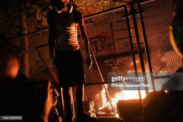 People gather to protest in front of the Mark O. Hatfield federal courthouse in downtown Portland as the city experiences another night of unrest on...