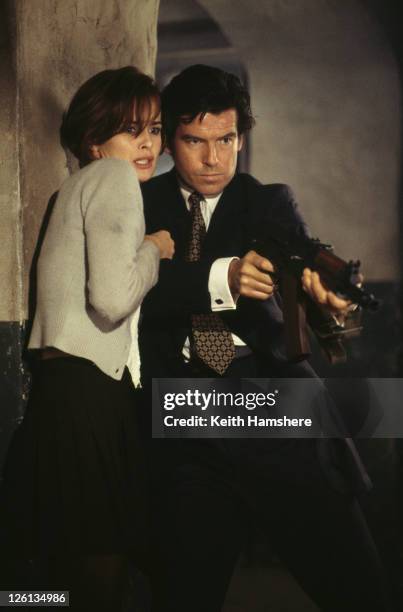 Polish actress Izabella Scorupco films a scene with Irish actor Pierce Brosnan for the James Bond film 'GoldenEye', 1995.