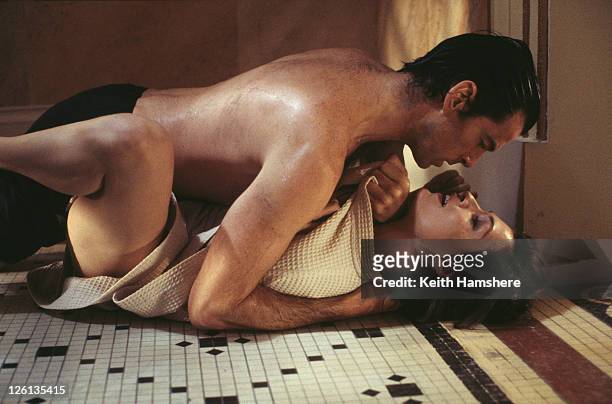 Irish actor Pierce Brosnan stars as James Bond alongside Dutch-born actress Famke Janssen as the villainous Xenia Onatopp in a sauna scene fight from...