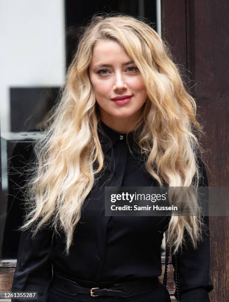 Amber Heard arrives at the Royal Courts of Justice, Strand on July 28, 2020 in London, England. The Hollywood Actor is suing News Group Newspapers...