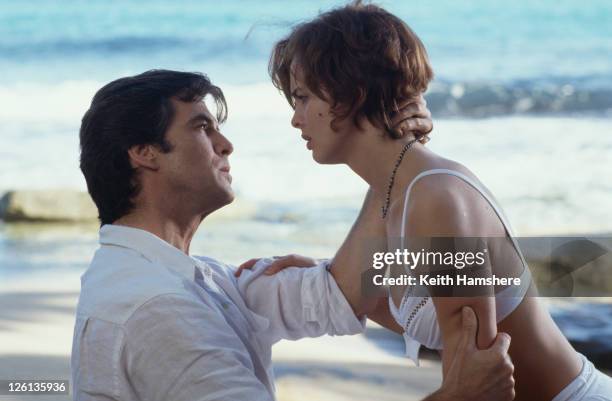 Polish actress Izabella Scorupco films a scene with Irish actor Pierce Brosnan at Laguna Tortuguero Beach, Puerto Rico, for the James Bond film...