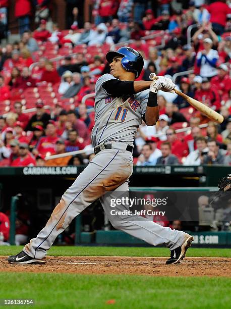 Ruben Tejada of the New York Mets hits a two run double against the St. Louis Cardinals at Busch Stadium on September 22, 2011 in St. Louis, Missouri.