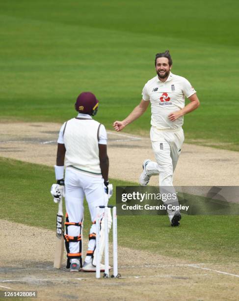 Chris Woakes of England celebrates after taking the wicket of Shamarh Brooks of West Indies during Day Five of the Ruth Strauss Foundation Test, the...