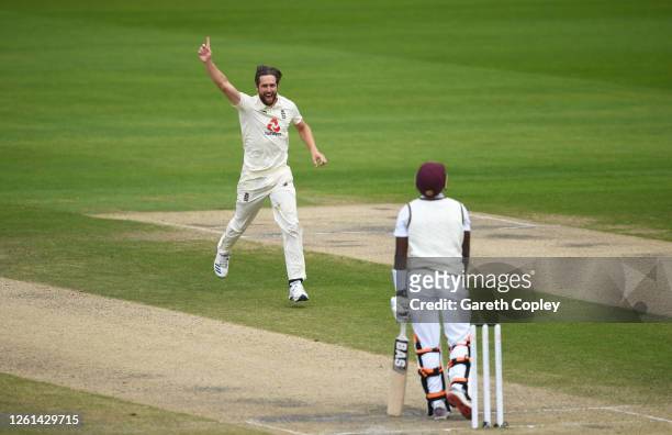 Chris Woakes of England celebrates after taking the wicket of Shamarh Brooks of West Indies during Day Five of the Ruth Strauss Foundation Test, the...