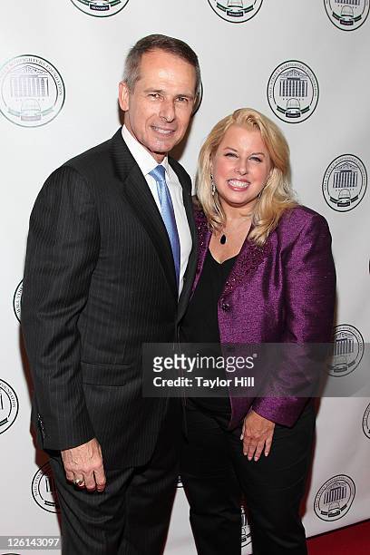 Retired General Peter Pace and guest attend the 2nd annual Wall Street Warfighters Foundation Charity Poker tournament at Intrepid Sea-Air-Space...
