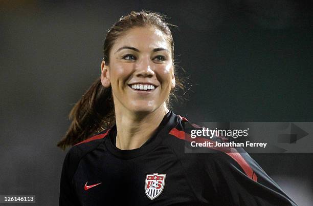 Goal Keeper Hope Solo of the United States warms up against Canada on September 22, 2011 at Jeld-Wen Field in Portland, Oregon.