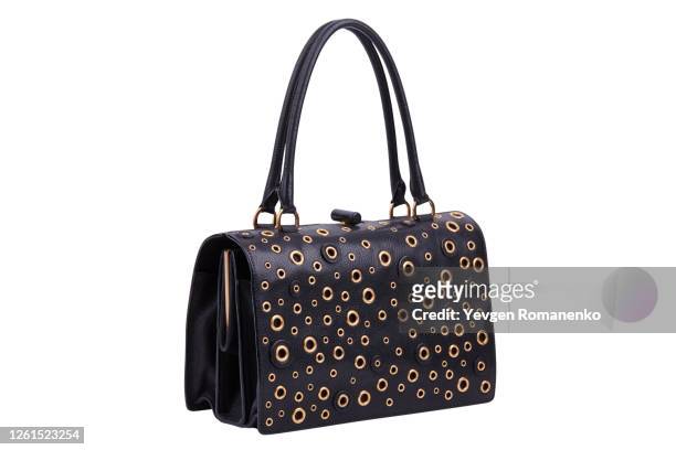 black leather purse with gold grommets on white background - brown purse stock-fotos und bilder