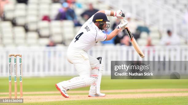 Ian Bell of Warwickshire plays the cover drive shot while batting during day one of the friendly match between Warwickshire and Worcestershire at...