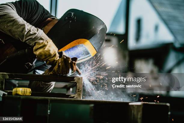 industrial welder with torch - ship fumes stock pictures, royalty-free photos & images