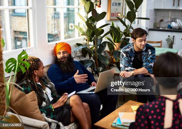 multi ethnic group sharing ideas for new business - sikh fotografías e imágenes de stock
