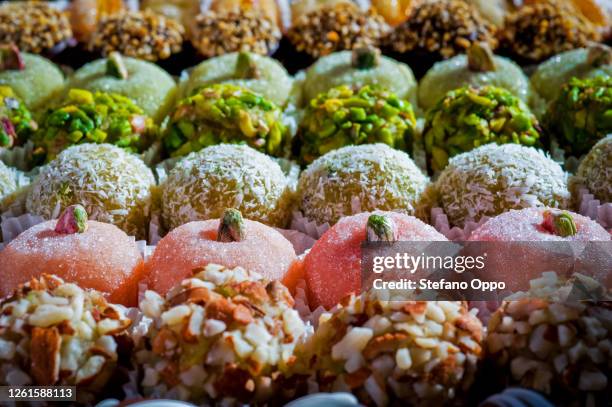 high angle close up of a selection of almond sweets in palermo, sicily. - sicilia foto e immagini stock
