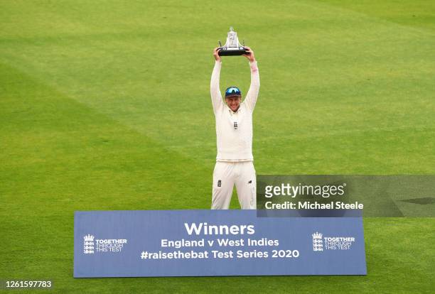 Joe Root of England poses with the Wisden Trophy after England win the series 2-1 during Day Five of the Ruth Strauss Foundation Test, the Third Test...