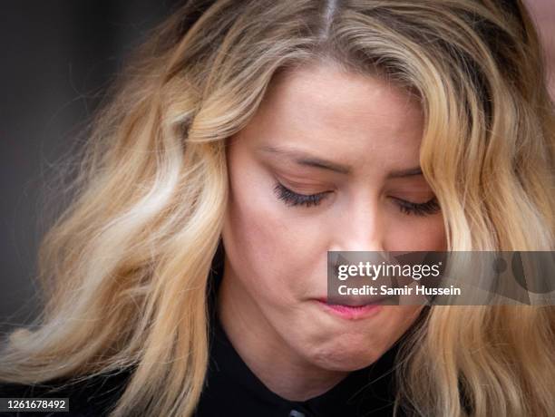 Amber Heard gives a speech after the trial at the Royal Courts of Justice, Strand on July 28, 2020 in London, England. Hollywood Actor Johnny Depp is...