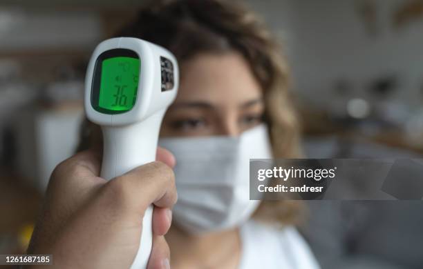 Check Body Temp 979 Body Temperature Scanning Stock Photos, High-Res Pictures, and ...