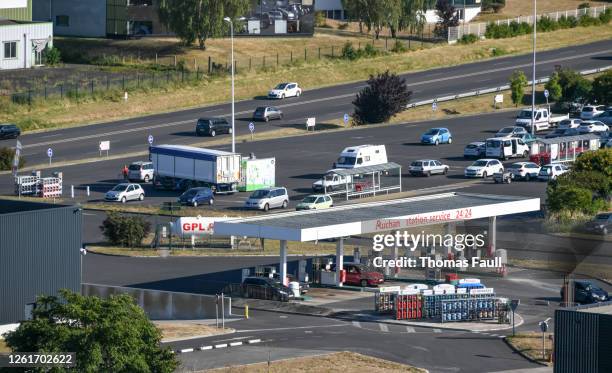 auchan gas station in jaunay-clan in france - station service france stock pictures, royalty-free photos & images