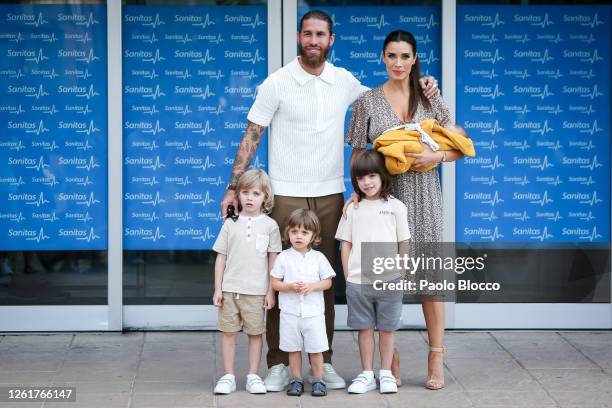 Real Madrid player Sergio Ramos and his wife Pilar Rubio present their new born child Maximo Adriano at La Moraleja Hospital on July 28, 2020 in...