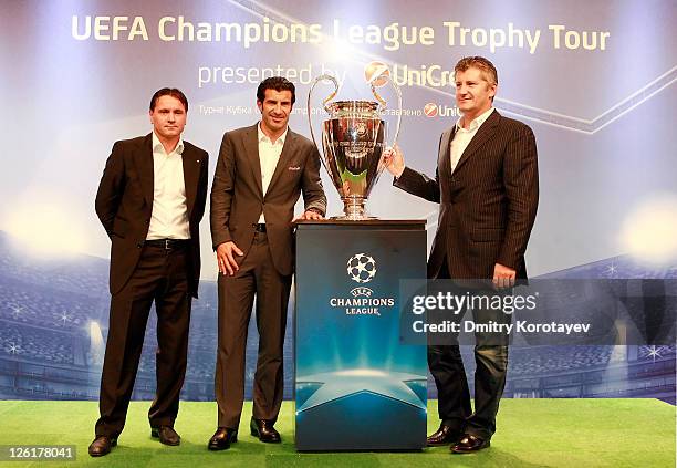 Dmitri Alenichev, Luis Figo and Davor Suker poses for photo during the UEFA Champions League Trophy Tour 2011 on September 23, 2011 in Moscow, Russia.