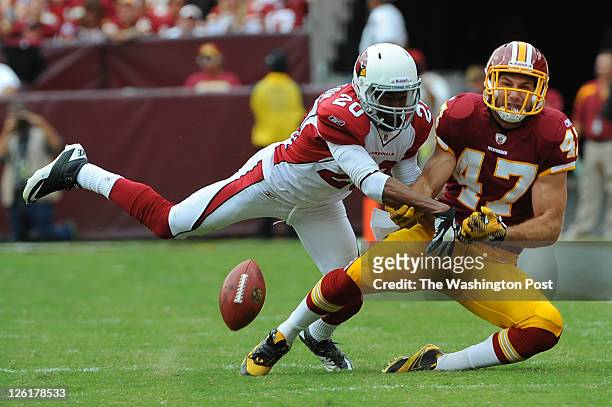 Arizona Cardinals cornerback A.J. Jefferson breaks up a pass intended for Washington Redskins tight end Chris Cooley during the fourth quarter at...