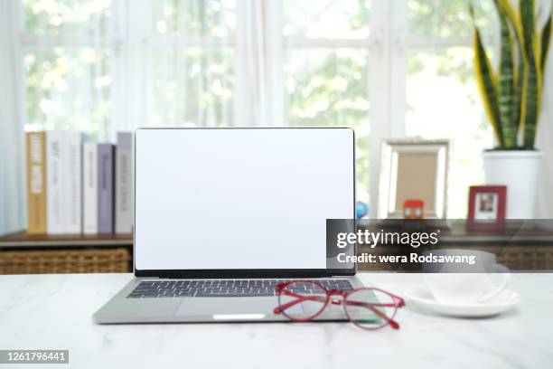 Empty Desk With Laptop Photos and Premium High Res Pictures - Getty Images