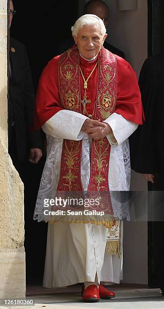Pope Benedict XVI emerges in order to lead an ecumenical devotion at Augustinerkloster abbey on September 23, 2011 in Erfurt, Germany. The Pope is in...