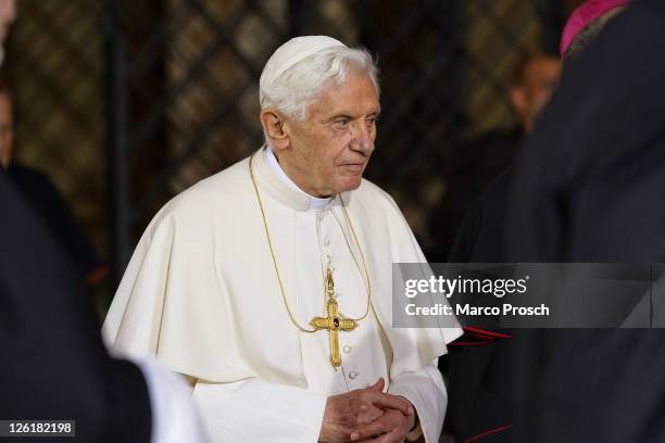 Pope Benedict XVI visits the main altar of the Dom cathedral on September 23, 2011 in Erfurt, Germany. The Pope is in Erfurt on the second of a...